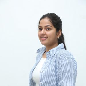 Tejaswi Rao’s Fresh Casual Look in Blue-White Striped Shirt – Latest Photoshoot