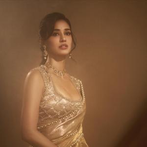 Disha Patani Shines in Elegant Golden Ethnic Look – Stunning Soft-Light Photoshoot