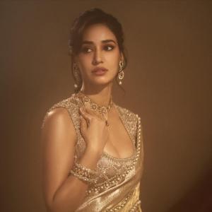 Disha Patani Shines in Elegant Golden Ethnic Look – Stunning Soft-Light Photoshoot