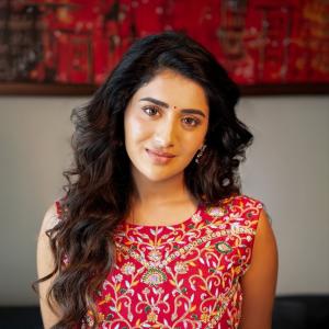 Actress Rashi Singh Shines in Elegant Red Traditional Outfit