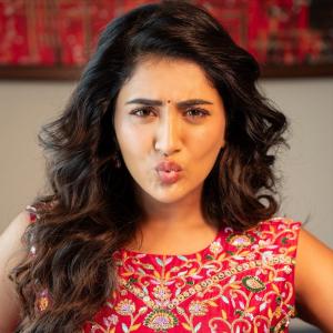 Actress Rashi Singh Shines in Elegant Red Traditional Outfit