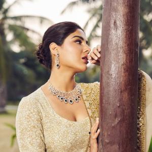 Actress Samyuktha Menon Looks Regal in Elegant Beige Traditional Ensemble