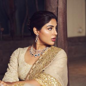 Actress Samyuktha Menon Looks Regal in Elegant Beige Traditional Ensemble