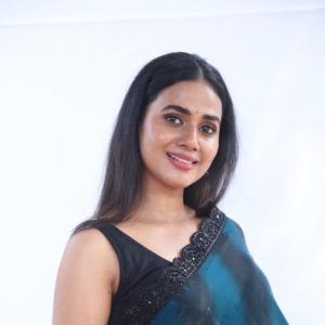 Shreya Rukmini Radiates Grace in Deep Teal Saree: Latest Photoshoot Look