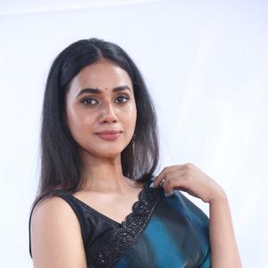 Shreya Rukmini Radiates Grace in Deep Teal Saree: Latest Photoshoot Look