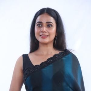 Shreya Rukmini Radiates Grace in Deep Teal Saree: Latest Photoshoot Look