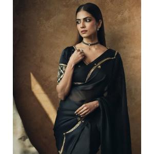 Actress Malavika Mohanan in Elegant Black Saree – Timeless Beauty & Cinematic Portrait
