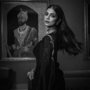 Actress Malavika Mohanan in Elegant Black Saree – Timeless Beauty & Cinematic Portrait