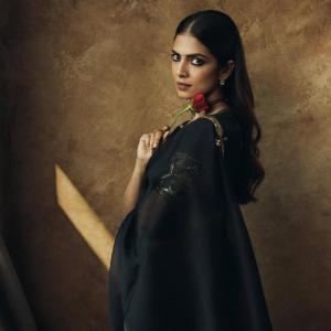 Actress Malavika Mohanan in Elegant Black Saree – Timeless Beauty & Cinematic Portrait