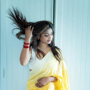 Actress Priya Vadlamani Radiates Grace in Yellow Saree