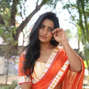 Rekha Norosha – Elegant Orange Saree Fashion Inspiration