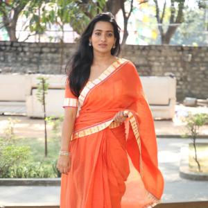 Rekha Norosha – Elegant Orange Saree Fashion Inspiration