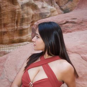 Simran Kaur Stuns in Elegant Red Dress Photoshoot Amid Scenic Rocky Canyon