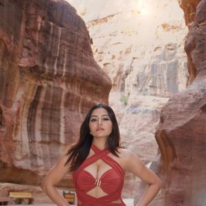 Simran Kaur Stuns in Elegant Red Dress Photoshoot Amid Scenic Rocky Canyon