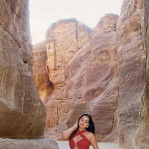 Simran Kaur Stuns in Elegant Red Dress Photoshoot Amid Scenic Rocky Canyon
