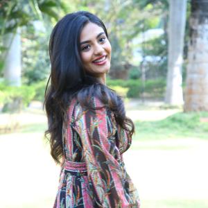 Nayana Sarika Elegant Outdoor Look in Vibrant Printed Dress