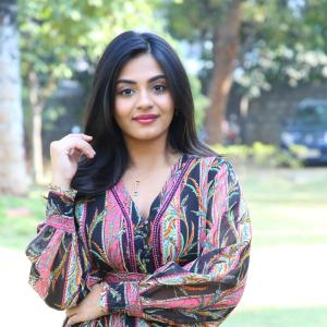 Nayana Sarika Elegant Outdoor Look in Vibrant Printed Dress