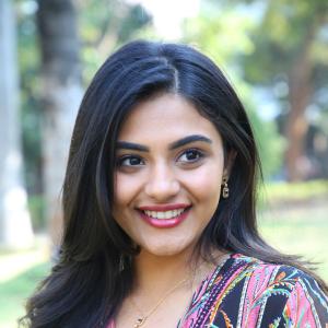 Nayana Sarika Elegant Outdoor Look in Vibrant Printed Dress