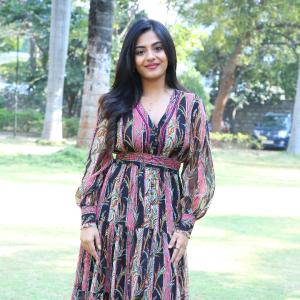 Nayana Sarika Elegant Outdoor Look in Vibrant Printed Dress