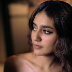 Actress Priya Warrior Showcasing Modern Confidence and Timeless Beauty