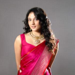 Actress Ritika Nayak Exudes Elegance in Vibrant Pink Saree and Traditional Jewelry