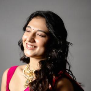 Actress Ritika Nayak Exudes Elegance in Vibrant Pink Saree and Traditional Jewelry