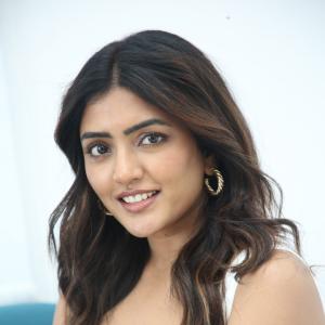 Eesha Rebba Stuns in Chic White Outfit with Minimalist Elegance