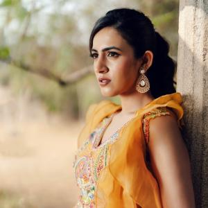 Niharika Konidela Stuns in Yellow Ensemble with Ruffles and Intricate Embroidery
