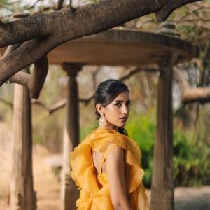 Niharika Konidela Stuns in Yellow Ensemble with Ruffles and Intricate Embroidery