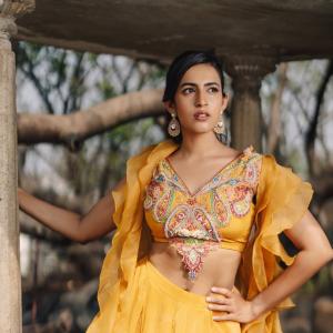 Niharika Konidela Stuns in Yellow Ensemble with Ruffles and Intricate Embroidery