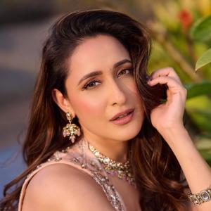 Pragya Jaiswal Stuns in Peach Lehenga Outdoor Photoshoot