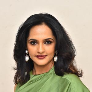 Jyoti Poorvaj Stuns in Elegant Green Satin Gown Photoshoot