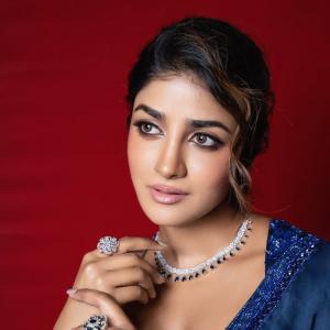 Dimple Hayathi in Stunning Blue Outfit: A Portrait of Elegance