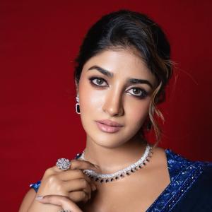 Dimple Hayathi in Stunning Blue Outfit: A Portrait of Elegance