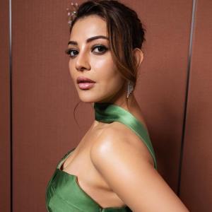 Kajal Aggarwal Stuns in Elegant Green Gown: A Portrait of Grace