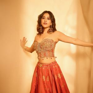 Nabha Natesh in Elegant Orange Lehenga Choli: A Portrait of Grace