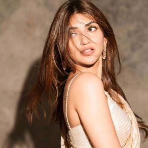 Actress Sreeleela in Elegant Ivory Saree: A Picture of Grace