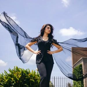 Kriti Shetty: Elegant Black Outfit with Sheer Cape Fashion Look