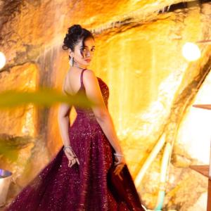 Actress Saanve Megghana in Elegant Maroon Sequin Gown with Jewelry