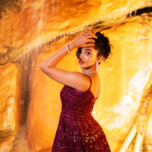 Actress Saanve Megghana in Elegant Maroon Sequin Gown with Jewelry