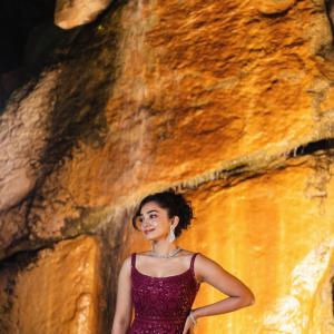 Actress Saanve Megghana in Elegant Maroon Sequin Gown with Jewelry