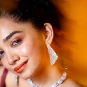 Actress Saanve Megghana in Elegant Maroon Sequin Gown with Jewelry