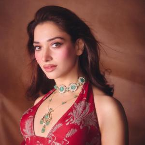 Tamannaah Bhatia Stunning in Red Dress with Exquisite Emerald Jewelry