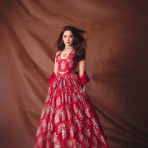 Tamannaah Bhatia Stunning in Red Dress with Exquisite Emerald Jewelry