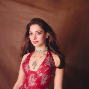 Tamannaah Bhatia Stunning in Red Dress with Exquisite Emerald Jewelry