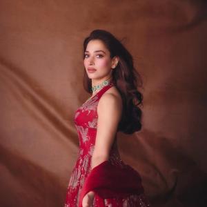 Tamannaah Bhatia Stunning in Red Dress with Exquisite Emerald Jewelry
