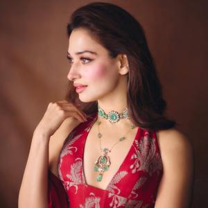 Tamannaah Bhatia Stunning in Red Dress with Exquisite Emerald Jewelry