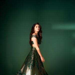 Kriti Shetty Shines in Green Gown with Elegant Emerald Jewelry