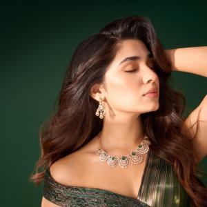 Kriti Shetty Shines in Green Gown with Elegant Emerald Jewelry