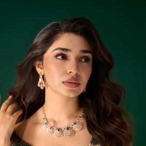 Kriti Shetty Shines in Green Gown with Elegant Emerald Jewelry